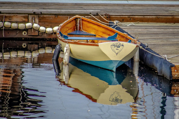 white-and-blue-boat-on-water